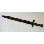 A French artillery sword with brass handle stamped 1859.