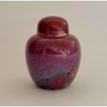 A Ruskin high fired mottled purple, red, green, and blue ginger jar. 1925 approx height 12-1/2 cm.