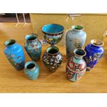 Seven cloisonné vases with a cloisonné goblet.