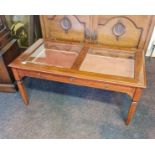 A modern glass top display coffee table.