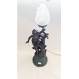 A spelter lamp with female figure base.