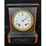 A black slate and red marble mantle clock with gold leaf floral design.approx 34cm.