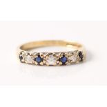 A hallmarked 9ct yellow gold sapphire and diamond half eternity ring, set with four round cut