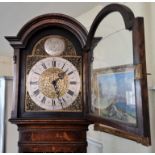 An oak long cased Tempus Fugit clock.