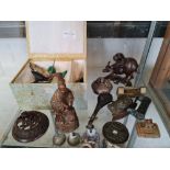 A collection of various oriental items to include fishermen figure locks carved stone fruit.