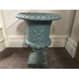 A cast iron garden urn, with foliage design, approx. height 53cm