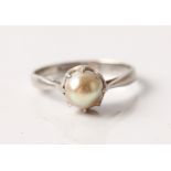 A pearl set ring, stamped platinum, ring size G1/2.