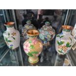 Three cloisonné vases with two ginger jars.