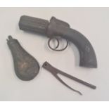 A six shot percussion cap pepperpot pistol with power flask and bullet mould.