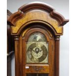 A Seth Thomas mahogany and walnut long-case clock with Westminster chime, brass face dial, large