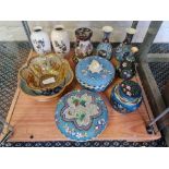 A collection of oriental vases pots with lids and basket bowl.