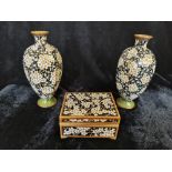 Two cloisonné vases with blossom design with matching box.