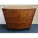 A mahogany five drawer chest.