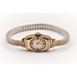 A hallmarked 9ct yellow gold cased ladies wrist watch, on expandable bracelet strap.