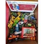 A box containing a quantity of diecast cars and 12 little lead soldiers