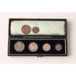 A boxed set of 1892 Maundy coins, together with a 1716 coin and a 1910 threepence.