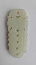 A pale green jade pendant of two phoenixes. Approx length 7.5cm.
