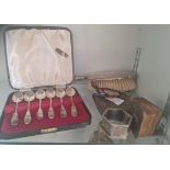 A collection of silver items to include spoons cigarette case brush etc.