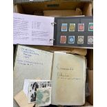 A box containing a quantity of various stamp albums and stamps.