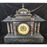 A black slate and marble architectural style mantle clock.approx 40cm.