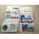An accumulation of Guernsey stamps, F.D.C.‘S, booklets and presentation packs. Some still in packs