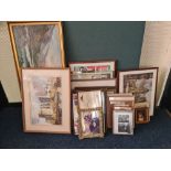 A collection of framed prints and pictures.