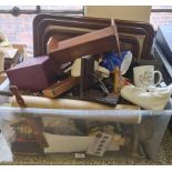 A box of mixed items to include three oak trays book ends figures and boats.