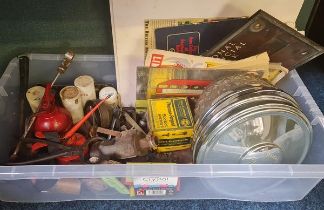 A box of tools oil cans and bank letter box .