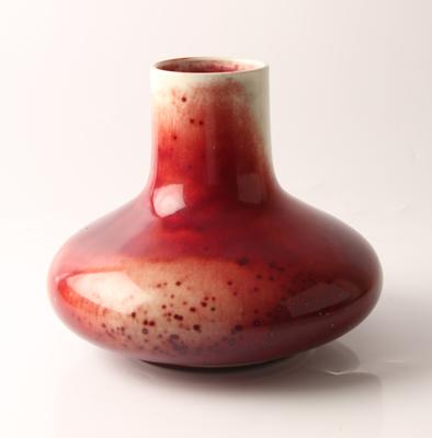 A Ruskin high fired red to cream bulbous vase. 1922 approx height 20cm