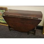 A 18th century oak peg joint drop leaf table.