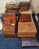 A collection of wooden boxes tea caddy and sewing box.