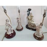 A collection of 4 figurine table lamps.