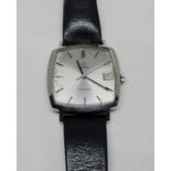 A gents Omega Genève wrist watch, the silver-tone dial having hourly baton markers with date