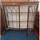 A mahogany glazed display cabinet.