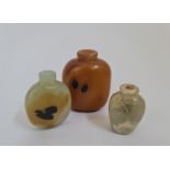 Three Chinese snuff bottles.