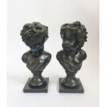 A pair of spelter cherubs busts with grapes and flowers . 31 cm.
