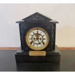A black slate Antonia U.S.A mantle clock. Presented to Chief Constable of Banbury 1914. 28 1/2cm.