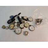 A collection of various wristwatches and pocket watches.