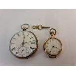 A hallmarked silver pocket watch, white dial having aperture to 6 o'clock, along with a fob watch,