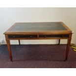 A mahogany library table with leather top on four square tapered leg and two drawers.