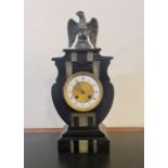 An art deco black slate and green marble Blurton of Stourbridge mantle clock with eagle to top. 40