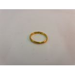 A hallmarked 22ct yellow gold wedding band ring, ring size I½, approx. weight 3g.