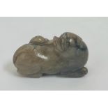 WITHDRAWN. A Carved Chinese green to brown jade foo dog with duck with a wooden stand approx 6cm 3c