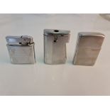 Three cigarette lighters to include a RONSON, ZIPPO and a GAS Brotherlite.