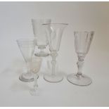 Four 19th century drinking glasses two engraved with birds and a later opaque twist stem wine