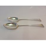 Two hallmarked silver serving spoons.