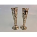 Two hallmarked silver fluted patterned vases.