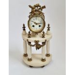 A French white marble four column portico clock with floral swag to face. 43cm.