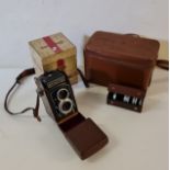 A Rolleicord F&H camera with box lens filters and case.