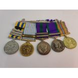 A group of five medals, to include Korean, Suez Canal, Malayan. two unnamed.
